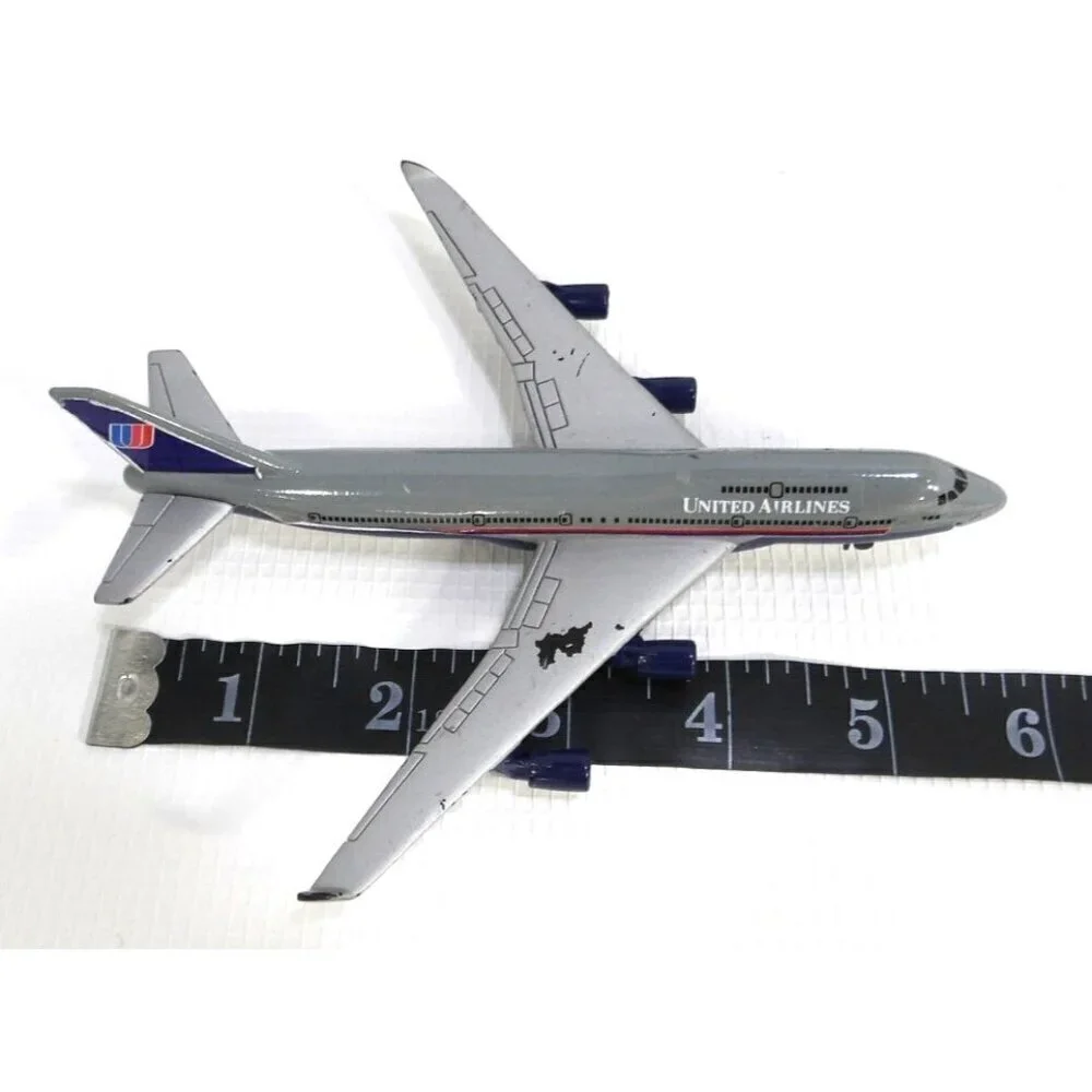 UNITED AIRLINES plastic & metal tiny plane and three trucks set of four vehicles